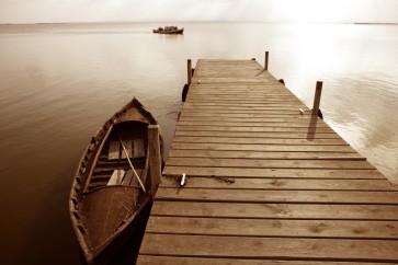 Horace Harper - Wooden Landing Jetty With Boat on Tropical Beach - Sepia