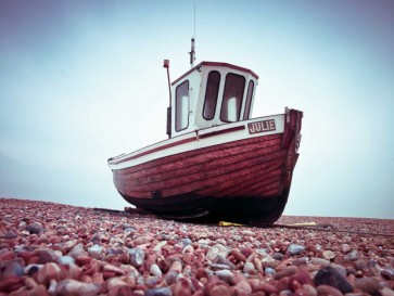 Assaf Frank - Boat moored on pebbled Beach