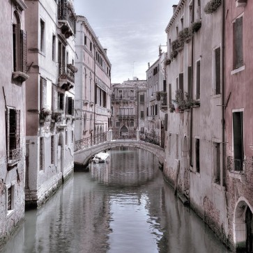 Assaf Frank - Old buildings with small bridge over narrow canal-Venice-Italy