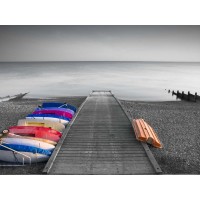 Assaf Frank - Kayaks on the side of pier