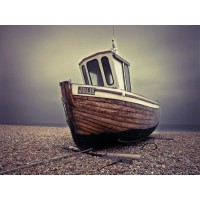 Assaf Frank - Boat moored on pebbled Beach
