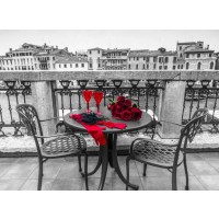 Assaf Frank - Bunch of Roses with wine glasses and female hand gloves on cafe table, Venice, Italy