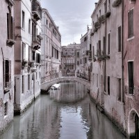 Assaf Frank - Old buildings with small bridge over narrow canal-Venice-Italy
