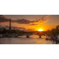 Assaf Frank - View of the Eiffel Tower with a bridge in the foreground during sunset, Paris, France