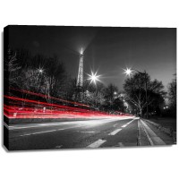 Assaf Frank - Strip lights on a road next to the Eiffel tower