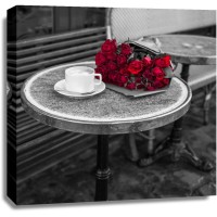Assaf Frank - Bunch of flowers on sidewalk cafe table, Paris, France