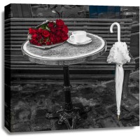 Assaf Frank - Bunch of flowers on sidewalk cafe table, Paris, France