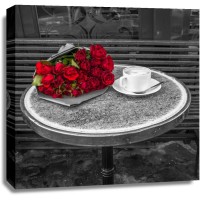 Assaf Frank - Bunch of flowers on sidewalk cafe table, Paris, France