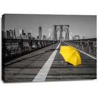 Assaf Frank - Yellow umbrella on pedestrian walkway on Brooklyn bridge, New York