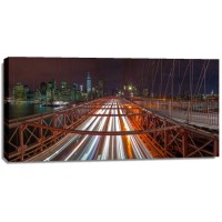 Assaf Frank - Evening view of Manhattan skyline from Brooklyn bridge