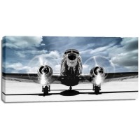 Gasoline Images - Airplane taking off in a blue sky