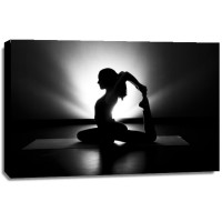 Ratchel Wood - Woman doing yoga  